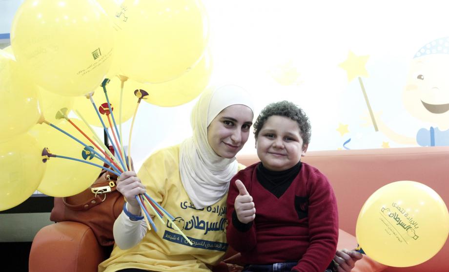 "With will we challenge cancer" World Cancer Day slogan for 2015