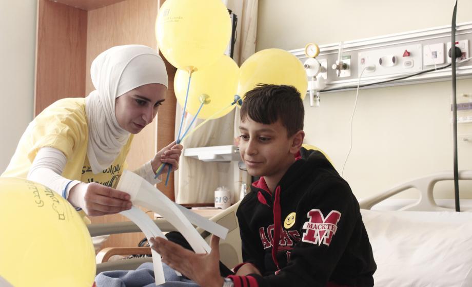 "With will we challenge cancer" World Cancer Day slogan for 2015